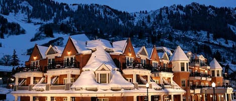 Ground level exterior view of the Hyatt Grand Aspen in Winter.