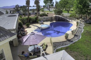 View of the pool and spa area from the game room balcony!