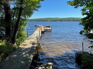 Expansive Dock with Adirondack Chairs, Bench Seat, Swim Ladders and Swim Float