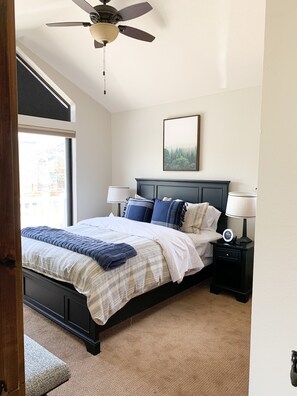 Guest bedroom; has a small private deck with nice views and comfy queen bed!