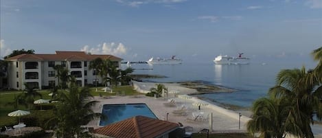 Early morning view of George Town Harbor, pool and beach from the balcony