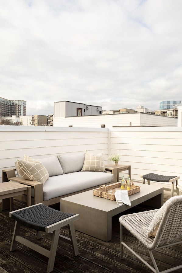 comfortable lounge seating on rooftop deck