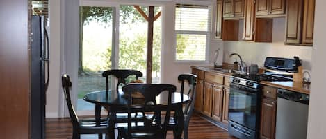 Kitchen area which opens onto a back patio area with beautiful views to the East