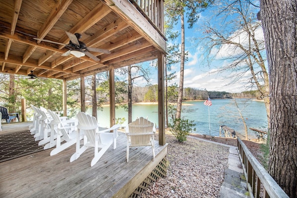 Adirondack chairs are on the porch are the perfect spot to watch the sunset. 