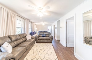 Upstairs living room with lots of seating. 