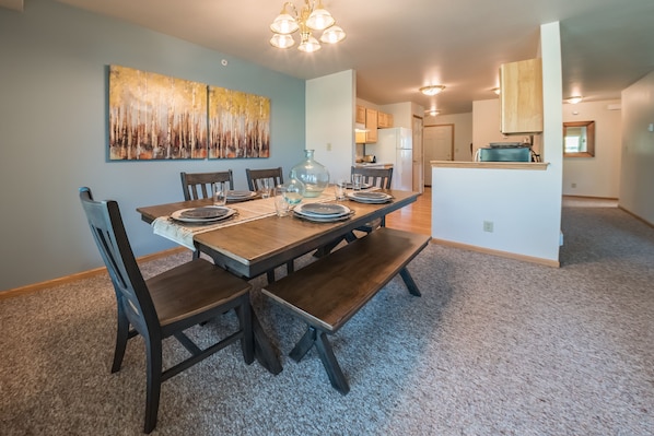 Spacious formal dining with open living.
