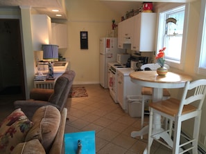 View of the breakfast nook and kitchen as seen from The Birdhouse entrance