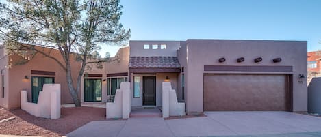 Single Level, 2 car garage.  3 bedrooms and 3 full bathrooms.  1650 sqft.