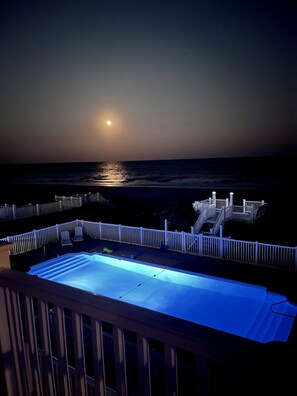 Common Night Views of the Moon-lit sky over the Ocean