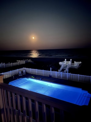 Common Night Views of the Moon-lit sky over the Ocean