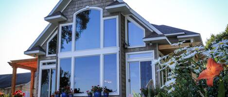 Front of home.  Living room overlooking lake.