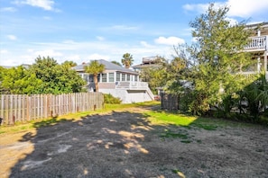 Unique to Tybee, the home comes with an extra lot for parking.