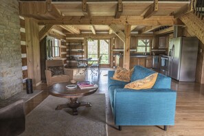 The living room, dining room, and kitchen area.