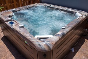 Newly added in 2018, Grandee 7 Seat Hot Tub!