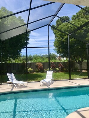 Our beautiful backyard with pool & patio 