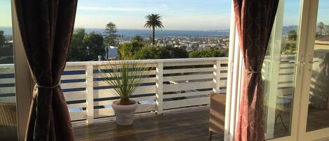 French doors open onto the deck.