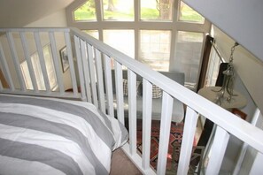 view from Loft area overlooking downstairs living area