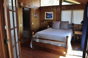 Upstairs bedroom has adjoining bathroom.