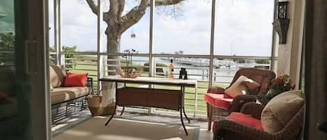 lanai looking out at Uncle Henry's Marina and the intracoastal waterway