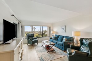 Enjoy the ocean views while relaxing in this comfortable living room.