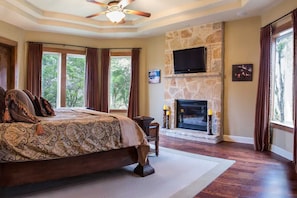 Rest like royalty in the grandeur of the master bedroom, furnished with a fireplace and king-sized bed! All sleep accommodations here come with clean and soft linens.