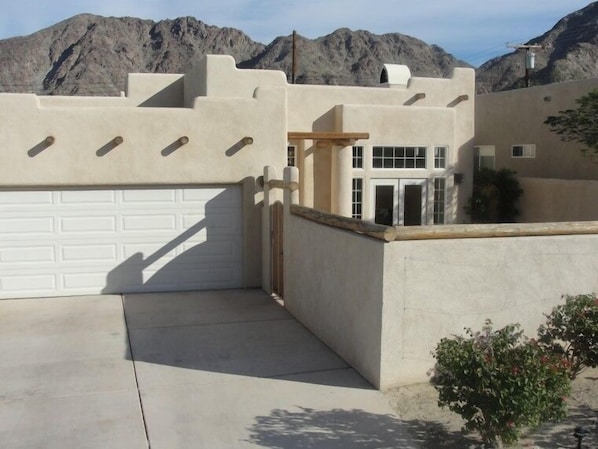 Front with Swimming Pool in Court Yard and Views of Santa Rosa Mountains