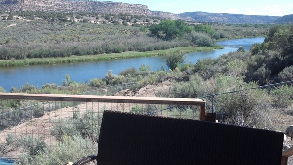 River but a few steps away from the balcony.