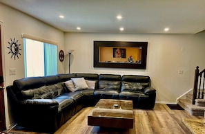 All new flooring on bottom floor of condo.