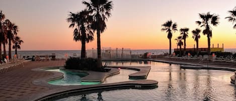 Beach side pool at sunset