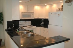 Fully Stocked Kitchen with Granite Countertops!