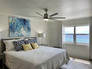 King sized bed in Master Bedroom with view of the Gulf.