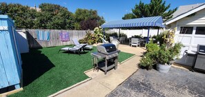 Backyard Patio & Cabana. BBQ, Music, Lounge Chairs and Outdoor showers.