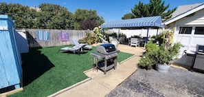 Backyard Patio & Cabana. BBQ, Music, Lounge Chairs and Outdoor showers.