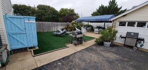 Newly installed turf! 2 BBQ's, fresh herb garden, private outdoor shower.