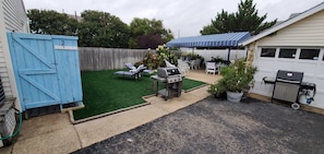 Newly installed turf! 2 BBQ's, fresh herb garden, private outdoor shower.