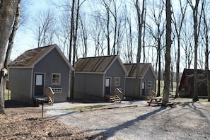 Our 3 cozy cabins. Each has a private deck w view of the pond and property!