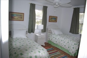 Second bedroom with two twin beds.