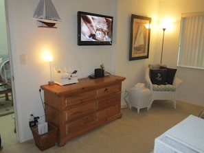 Dresser in master bedroom with sitting area.