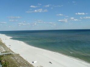 View of beach from balcony looking East