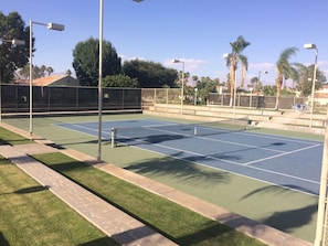 Beautiful tennis courts on property