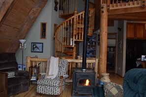 Cozy up to the pellet stove in a nice fuzzy throw and enjoy the unique woodwork.
