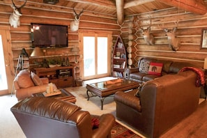 Cozy up in the living room after a long day of fishing, hiking, or hunting