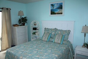 Restful Master Bedroom with a Tempur-Pedic Mattress and a Door to the Balcony.