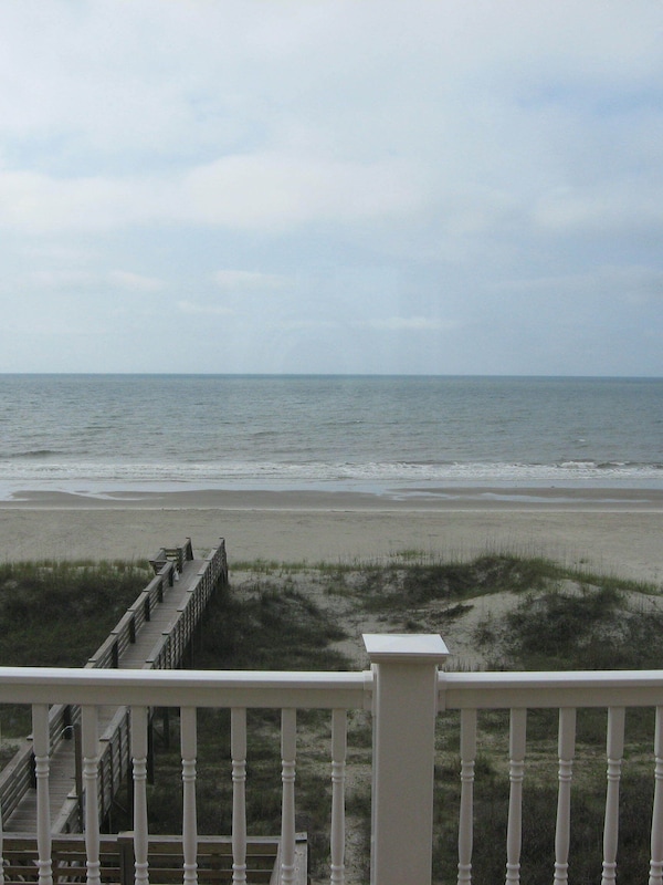 View of beach in front of the house. Taken from the upper deck.