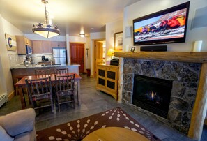 View of the condo dining and kitchen area  from the living area.