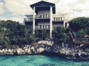 Back side of home facing waterfront and dock.