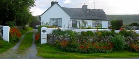 Our cottage on Coast Rd., a 10 min. walk to Monk's Pub