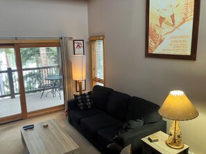 Living room sofa that converts to full-size bed