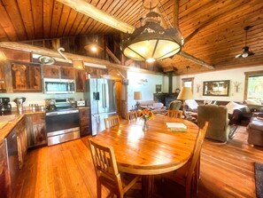 Main Cabin - Dining Table and Livingroom in the background.