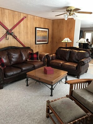 Large living space on main floor with 60 inch tv.  